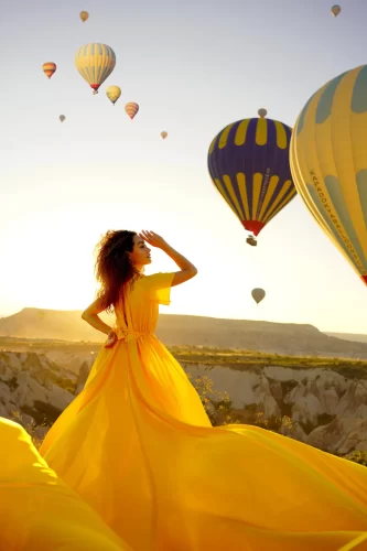 Yellow flying dress with hot air balloons